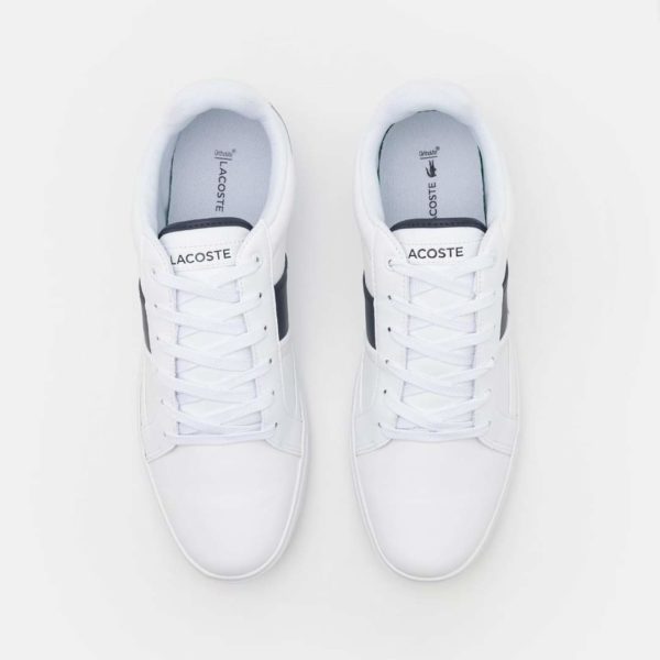 FB_IMG_1649162631527 LACOSTE Europa 0722 1 Sma Wht/Nvy LTH/SYN 7-43SMA0024042
