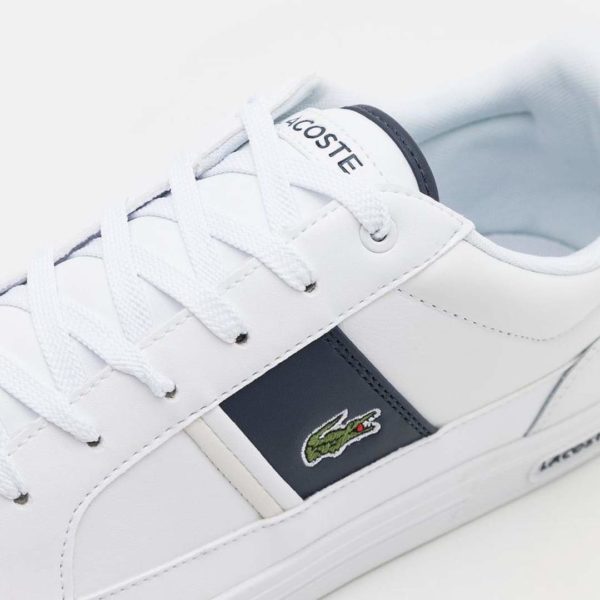 FB_IMG_1649162633878 LACOSTE Europa 0722 1 Sma Wht/Nvy LTH/SYN 7-43SMA0024042